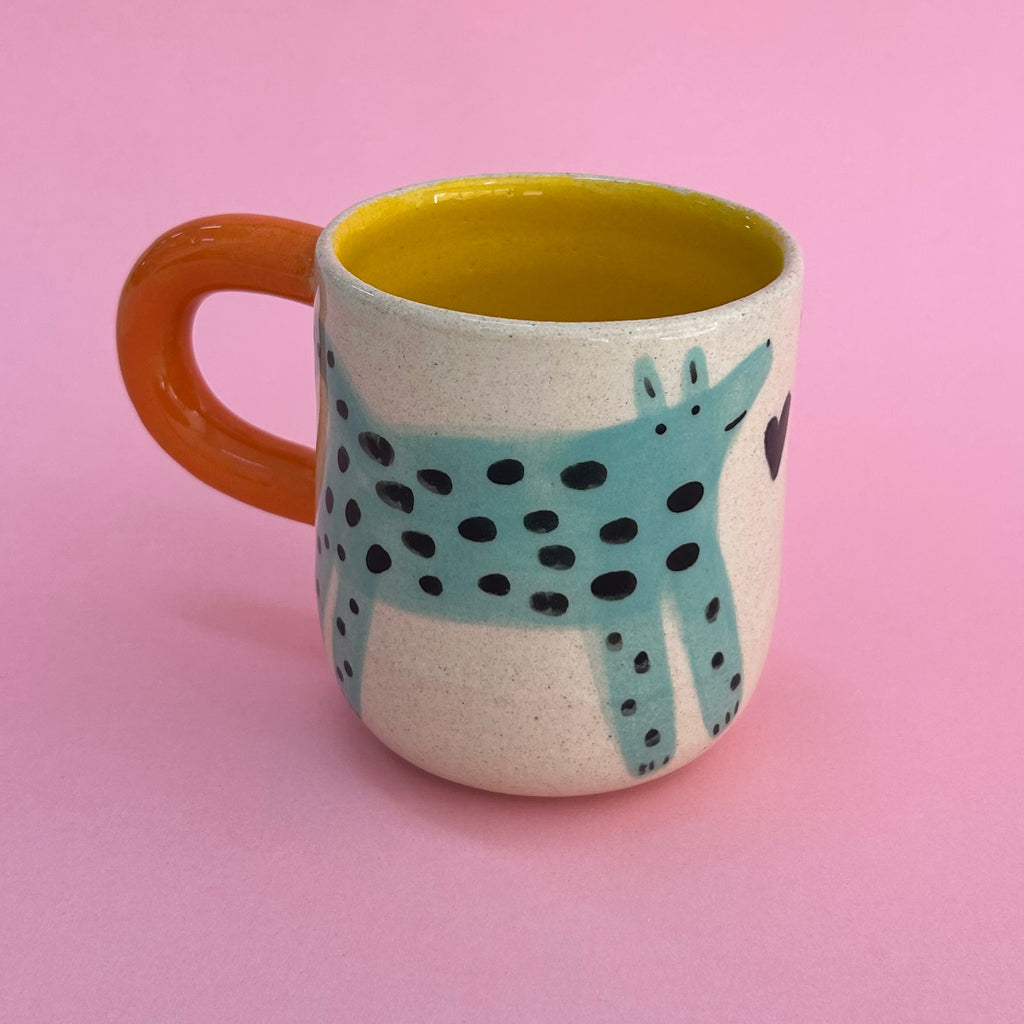 Taza perritos verdes
