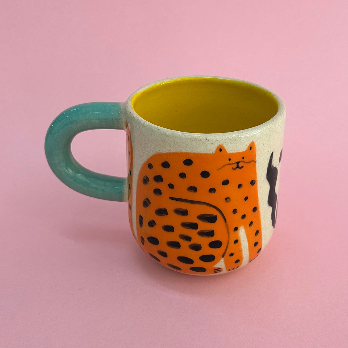 Taza gatos naranjas
