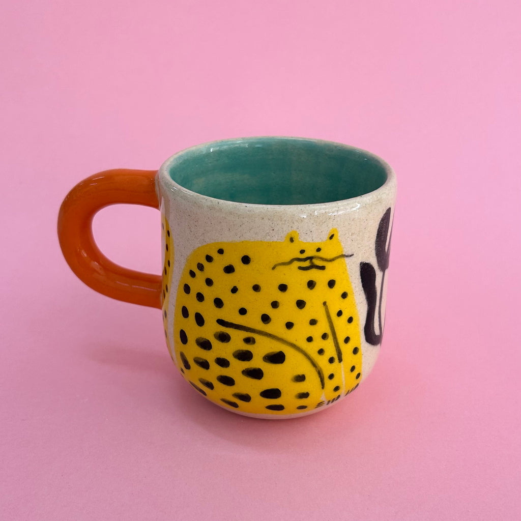 Taza gatos amarillos