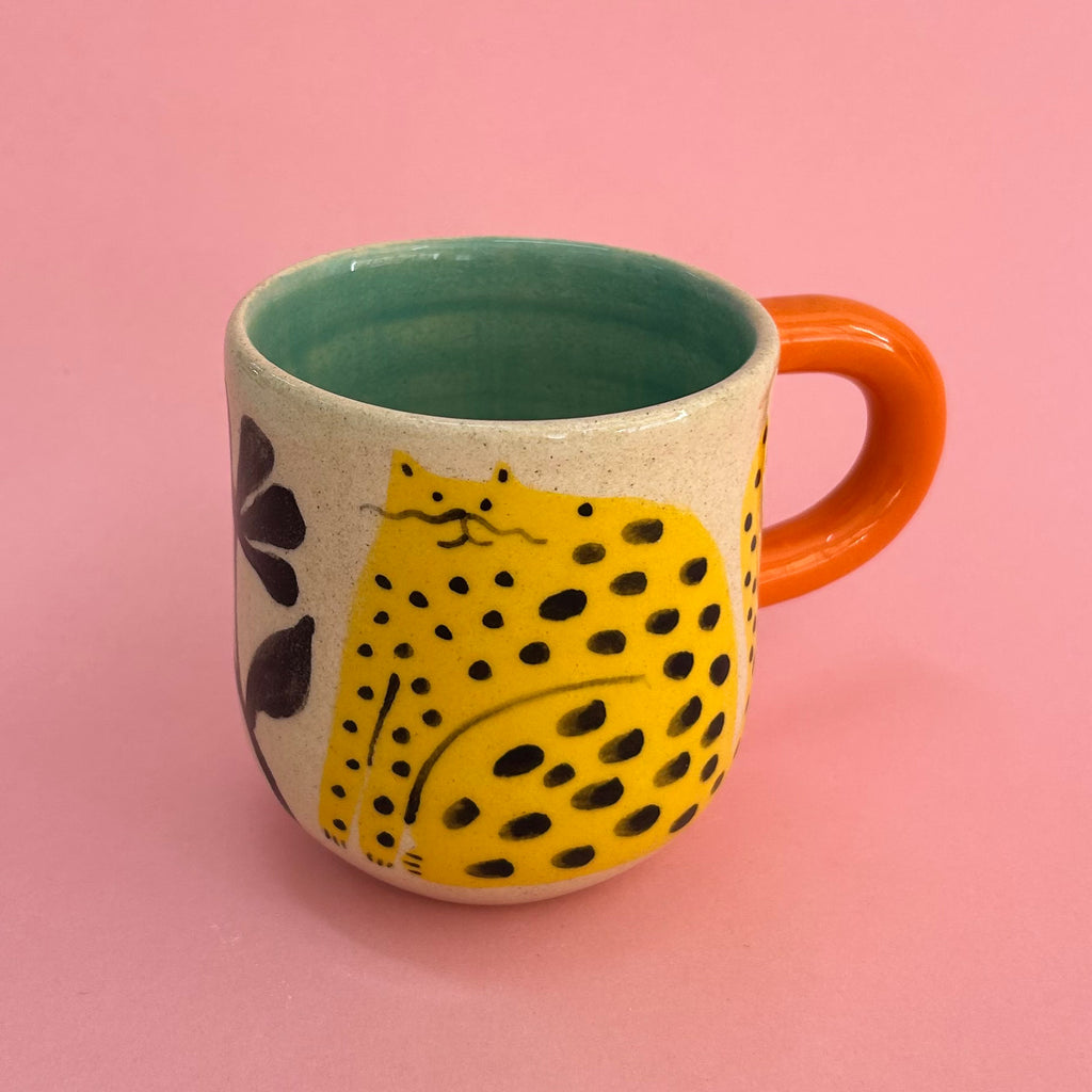 Taza gatos amarillos